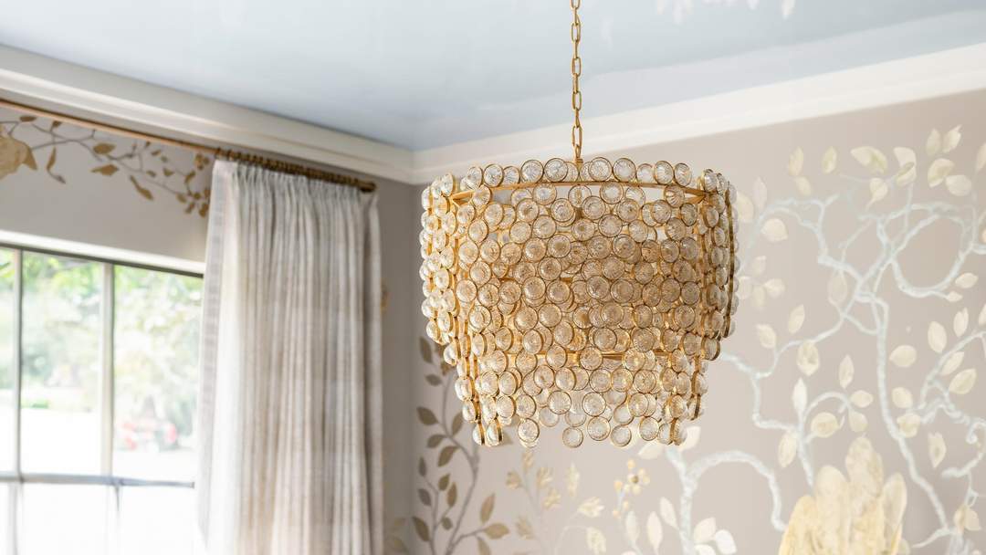 Gold chandelier hanging in home